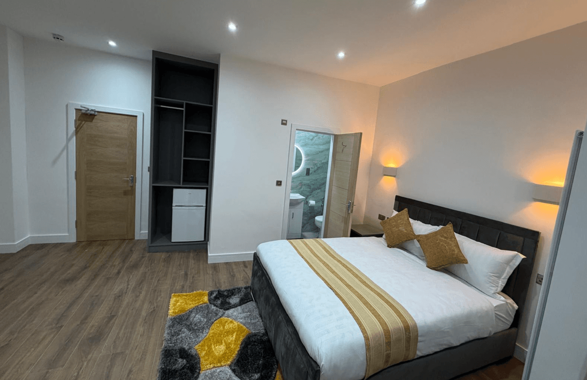 Bedroom — wide angle with wardrobe