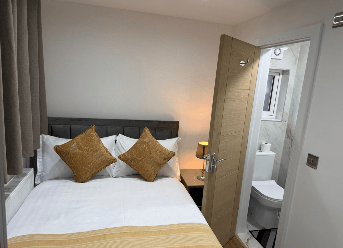 Bedroom with ensuite door